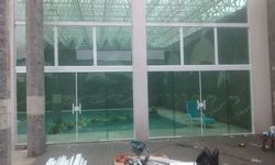 Produto Porta de vidro temperado para loja